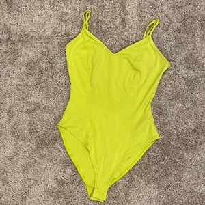 Lime green body suit